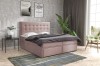 Rosa Boxspringbett mit integrierten Schubladen und elegantem Kopfende.