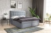 Hellblaues Polsterbett mit Stauraumschubladen und gestepptem Design.