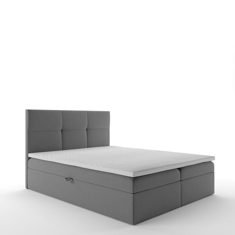 Graues Boxspringbett mit gestepptem Kopfteil in perspektivischer Ansicht.