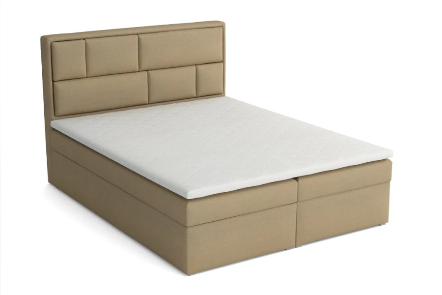 Klassisches Boxspringbett in Beige mit strukturiertem Kopfteil vor weißem Hintergrund.