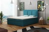 Modernes Boxspringbett in Türkis im Schlafzimmer mit Parkettboden und Deko