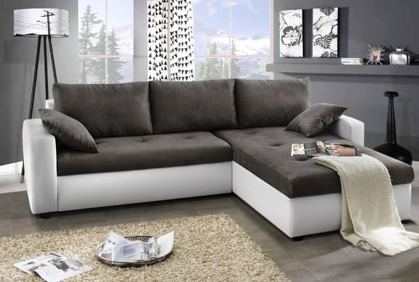 Stilvolles Ecksofa in Dunkelgrau und Weiß mit bequemer Polsterung.
