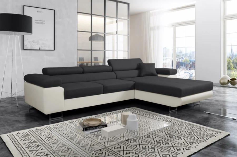 Modernes Ecksofa in Anthrazit und Weiß mit verstellbarer Kopfstütze.