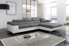 Stilvolles L-Sofa in Grau-Weiß für moderne Wohnlandschaften.