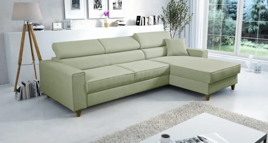 Stilvolles hellgrünes Ecksofa in L-Form für ein modernes und gemütliches Zuhause.