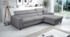 Graues Ecksofa in modernem Wohnzimmer mit verstellbaren Kopfstützen.