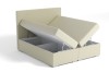Beiges Boxspringbett mit aufklappbarem Bettkasten und viel Stauraum.