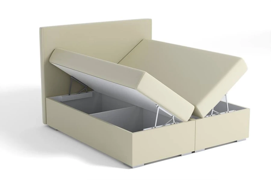 Beiges Boxspringbett mit geöffnetem Bettkasten für praktischen Stauraum.