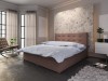 Modernes Boxspringbett in Braun mit gestepptem Kopfteil und hellblauer Bettwäsche im Schlafzimmer.