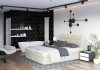Beiges Boxspringbett in hellem, modernem Schlafzimmer mit integriertem Badbereich und Wanddeko.