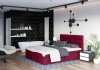 Elegantes weinrotes Boxspringbett in modernem Schlafzimmer-Design mit integriertem Bad.