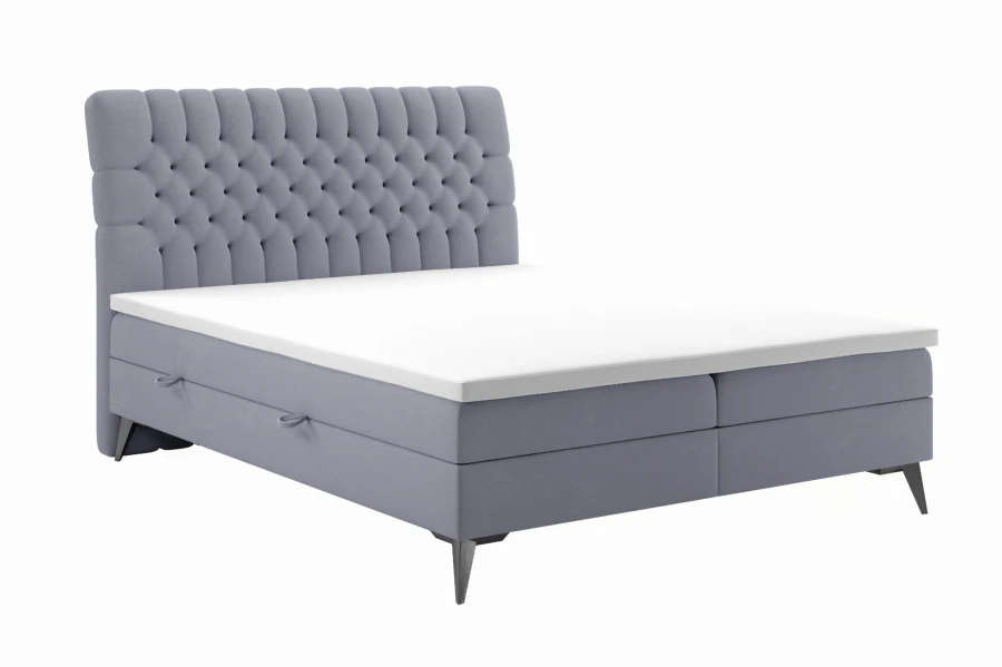 Lila Boxspringbett mit gestepptem Kopfteil und modernen Metallfüßen