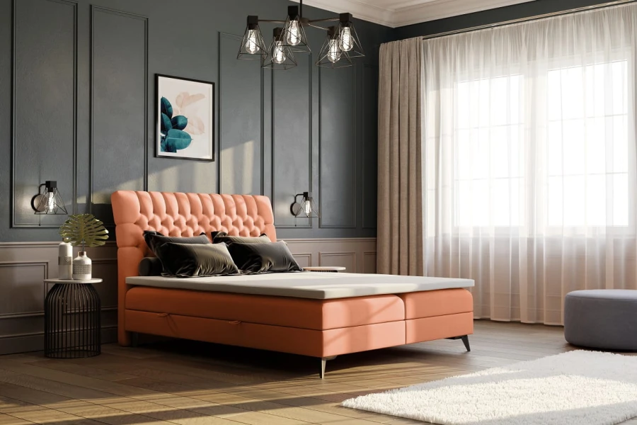 Korallefarbenes Boxspringbett im modern eingerichteten Schlafzimmer