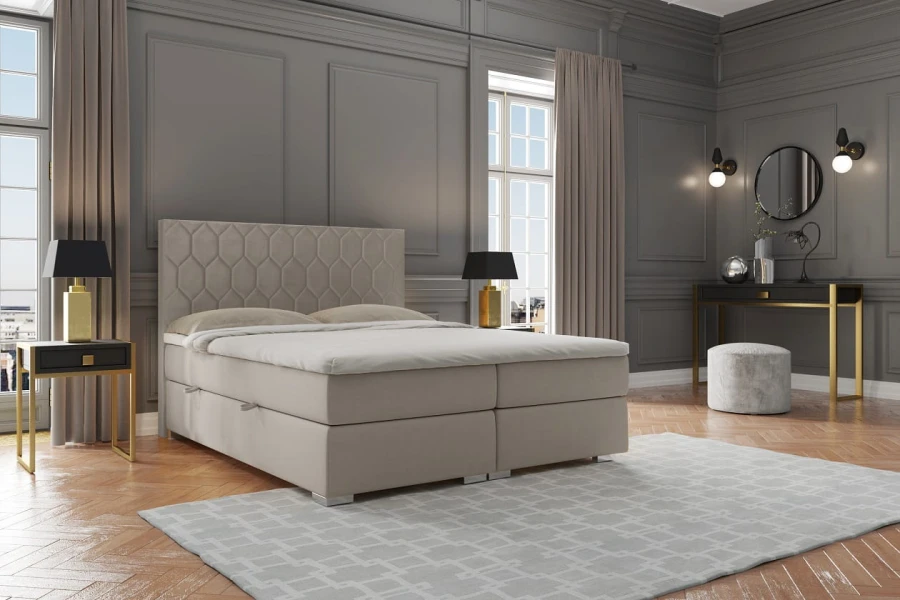 Beiges Boxspringbett mit Wabenmuster-Kopfteil in luxuriösem Schlafzimmer-Design.