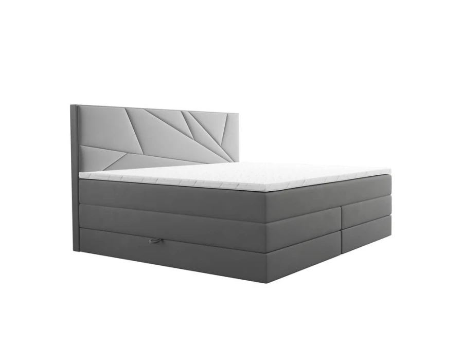 Modernes graues Polsterbett mit geometrischem Kopfteil-Design vor weißem Hintergrund.