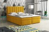 Gelbes Boxspringbett als moderner Farbakzent im Schlafzimmer Design