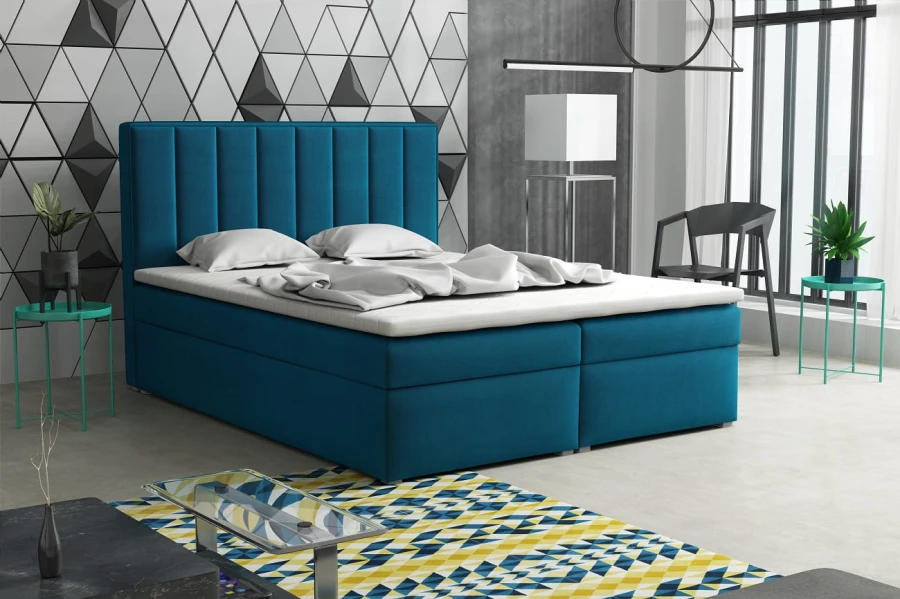 Türkisfarbenes Boxspringbett mit komfortabler Matratze und Topper