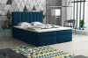 Dunkelblaues Boxspringbett mit elegantem vertikal gestepptem Kopfteil