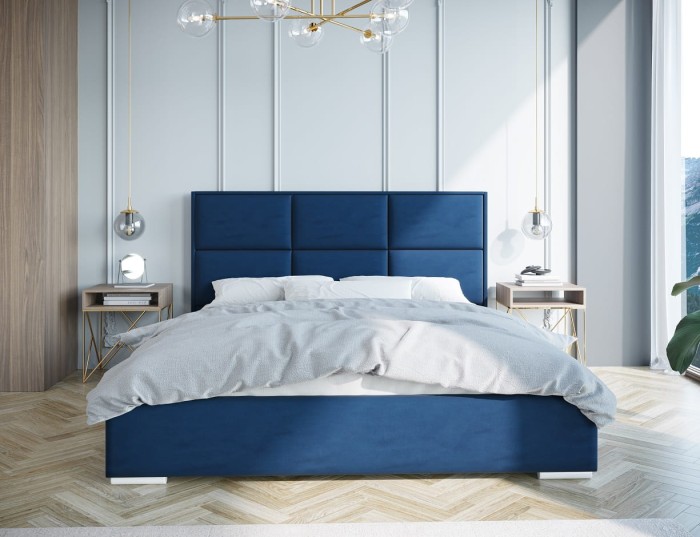 Blaues Polsterbett mit gestepptem Kopfteil im Schlafzimmer