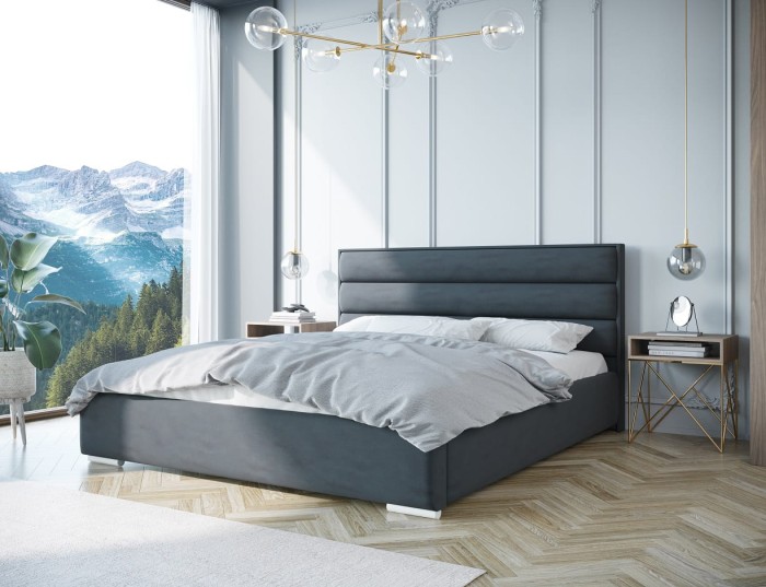 Modernes graues Polsterbett in einem hellen Schlafzimmer mit Bergblick.