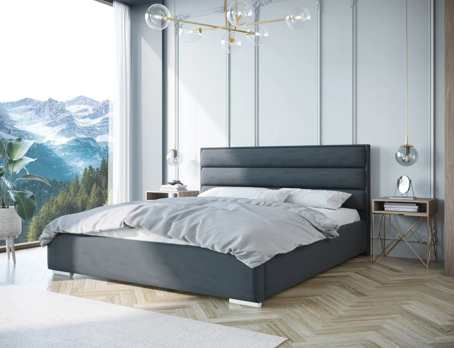 Modernes graues Polsterbett in einem hellen Schlafzimmer mit Bergblick.