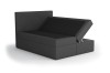 Graues Boxspringbett mit einem geöffneten Bettkasten für praktischen Stauraum.