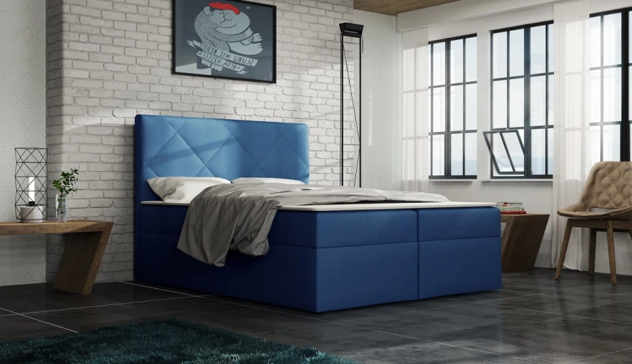 Blaues Boxspringbett mit stilvoller Rautensteppung im modernen Loft-Schlafzimmer.
