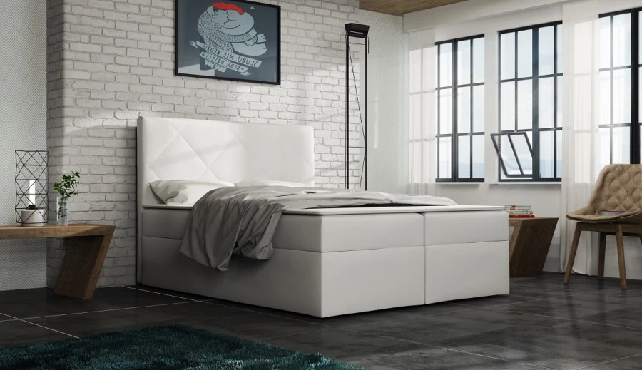Modernes Polsterbett in Weiß mit Topper und elegantem Kopfteil.