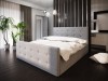 Graues Polsterbett mit gestepptem Kopf- und Fußteil im modernen Schlafzimmer-Design.