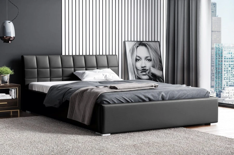 Modernes schwarzes Polsterbett mit gestepptem Kopfteil im Schlafzimmer.