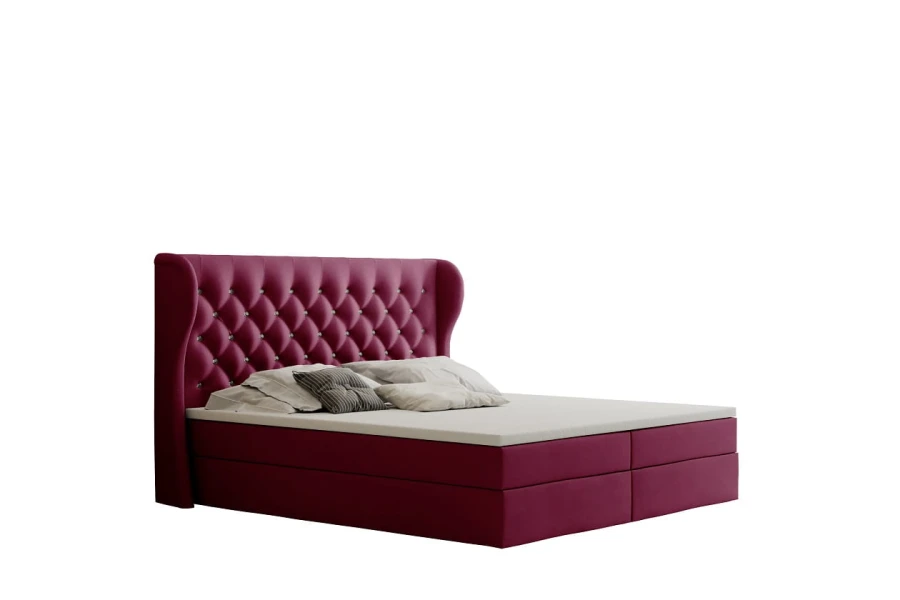 Magenta Polsterbett mit Knopfheftung am hohen Kopfteil.