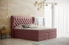 Rosa Boxspringbett mit Knopfheftung in elegantem Schlafzimmer