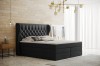 Schwarzes Boxspringbett mit Diamantsteppung im Schlafzimmer