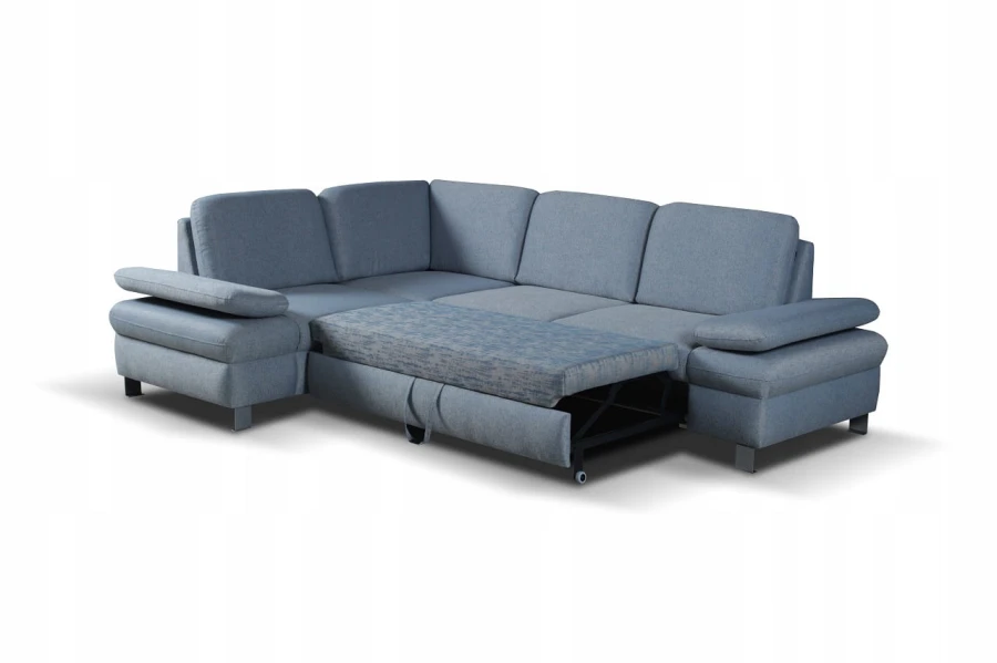 Blaues Ecksofa mit ausgezogener Bettfunktion als Schlafsofa.