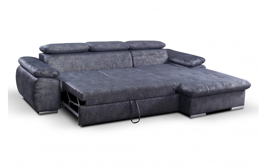 Blaues Ecksofa mit praktischer Schlaffunktion für Gäste ausgezogen.