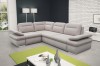 Modernes Ecksofa in Grau-Beige in einem stilvollen Wohnzimmer.
