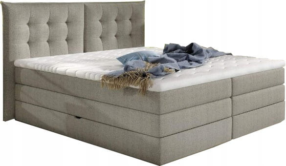 Modernes Boxspringbett in Beige mit gestepptem Kopfteil.