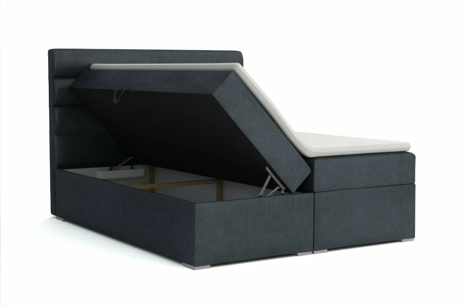 Dunkelgraues Bett mit seitlich offenem Bettkasten für praktischen Stauraum