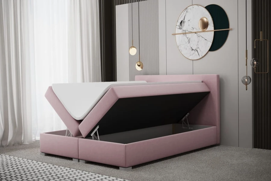 Modernes Boxspringbett in Rosa mit praktischem, offenem Bettkasten für zusätzlichen Stauraum.