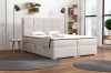 Beiges Boxspringbett in modern eingerichtetem Schlafzimmer.