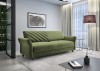 Modernes olivgrünes Sofa mit dekorativer Steppung im hellen Wohnzimmer.