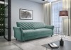 Stilvolles türkisfarbenes Sofa mit gesteppter Rückenlehne in hellem Ambiente.