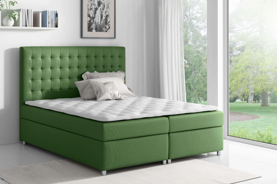 Grünes Boxspringbett mit Stoffbezug und gestepptem Kopfteil