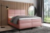 Elegantes Boxspringbett in Altrosa mit hohem Kopfteil für modernes Wohnen.
