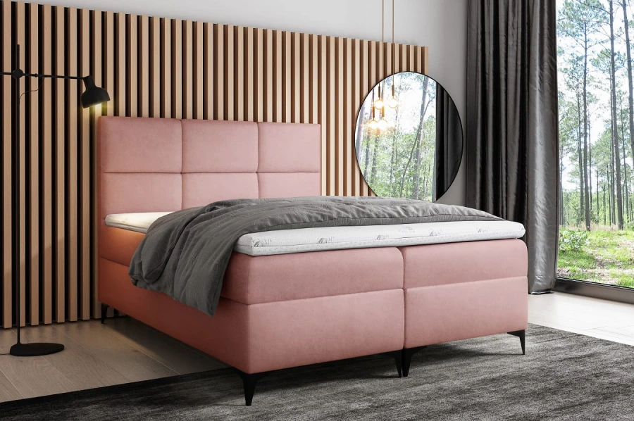 Elegantes Boxspringbett in Altrosa mit hohem Kopfteil für modernes Wohnen.