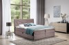 Stilvolles Boxspringbett in Mauve mit geometrisch gestepptem Kopfteil.