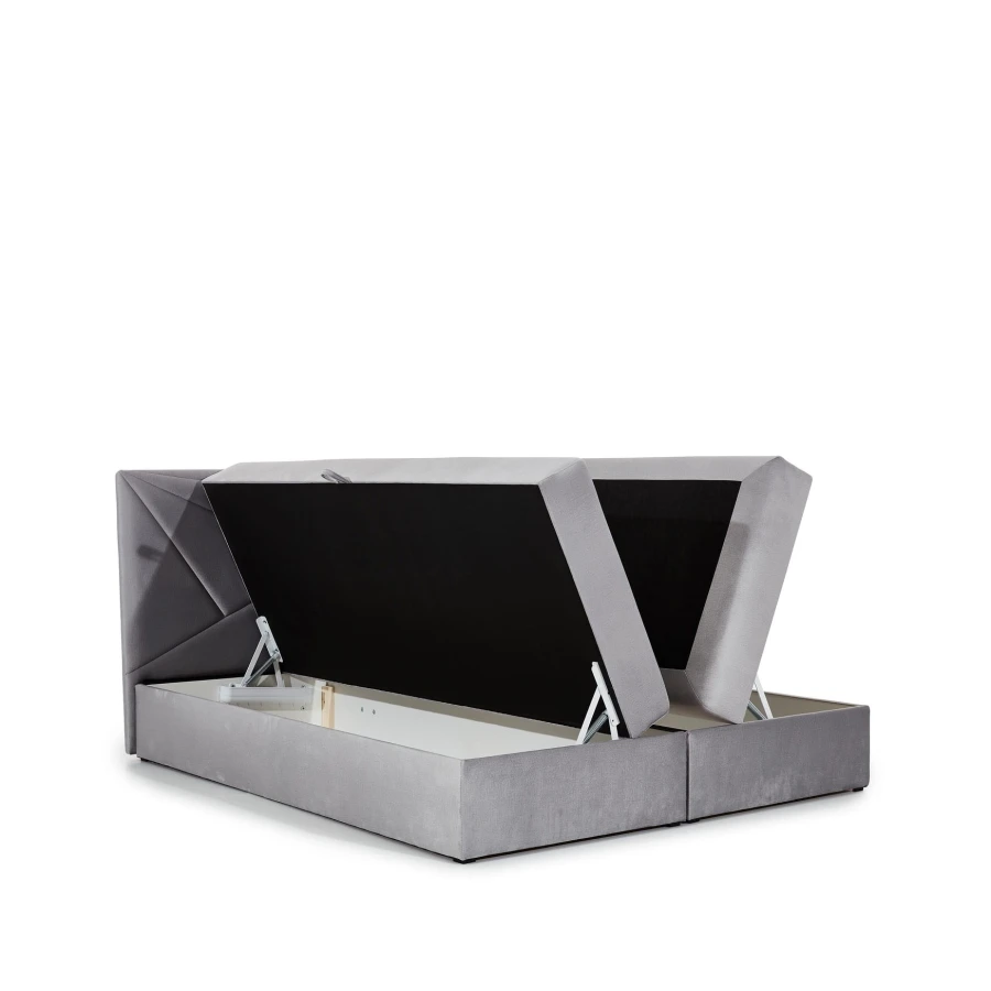 Boxspringbett in Grau mit integriertem Bettkasten und seitlicher Öffnung.
