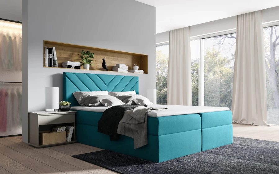 Türkisfarbenes Boxspringbett als Farbakzent in modernem, hellem Schlafzimmer.