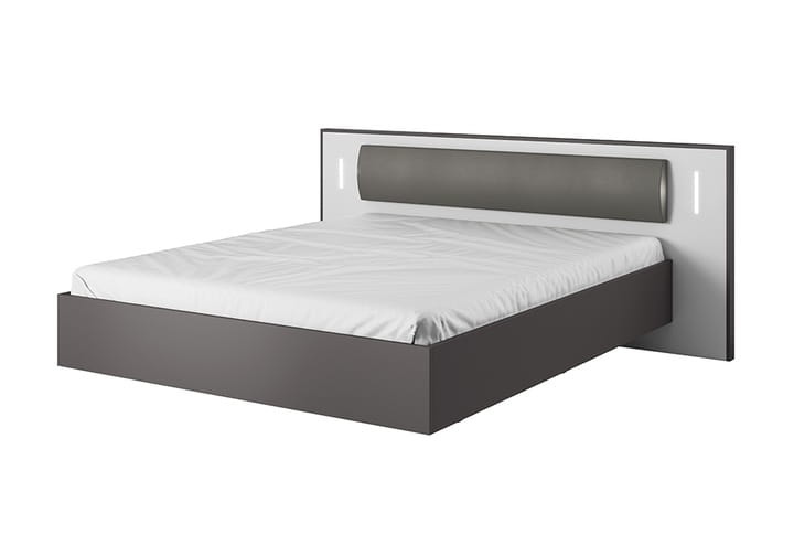 Doppelbett in Grau und Weiß mit gepolstertem Kopfteil und Beleuchtung.