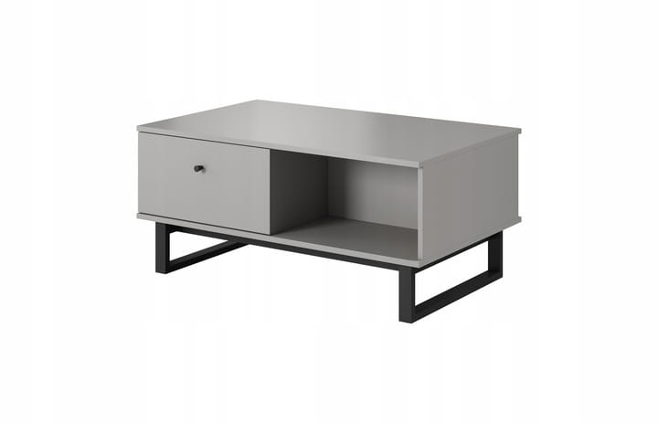 Moderner grauer Couchtisch mit Schublade und offenem Ablagefach auf schwarzen Metallfüßen.